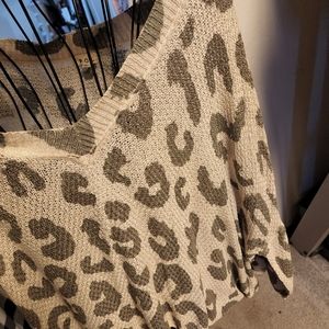 Over sized light sweater.